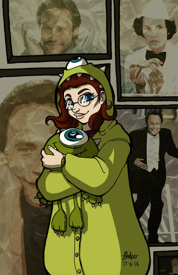 Girl in green monster costume hugging a stuffed animal while standing in front of many portraits of Billy Crystal